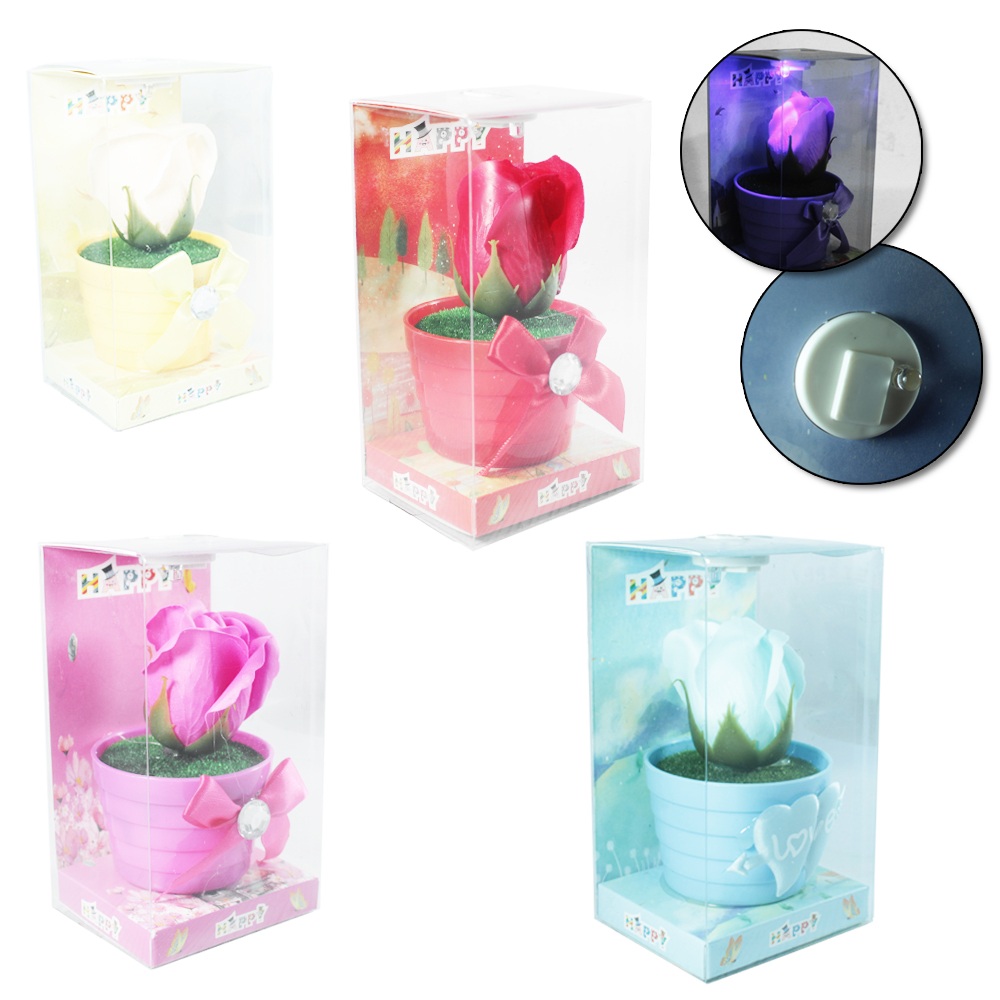 FLOR ARTIFICIAL COM VASINHO DE PLASTICO E MICRO LED A BATERIA COM CX PVC 13,2X7,5CM