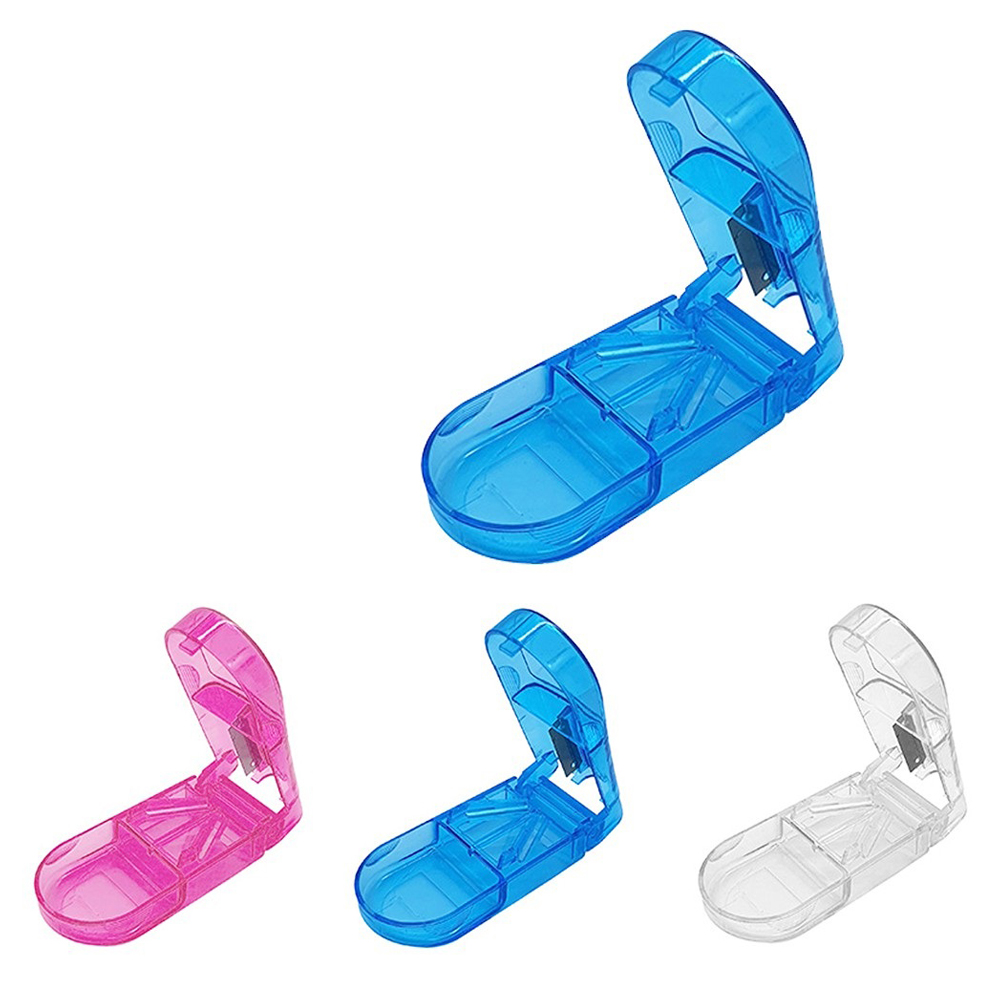 CORTADOR DE COMPRIMIDOS DE PLASTICO TRANSCOLOR 8,5X4X2,5CM NA SOLAPA